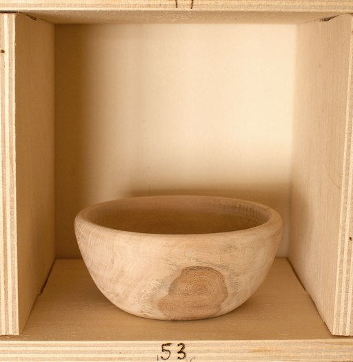 81 hand-turned wooden bowls on a home-made 9x9 compartment shelf